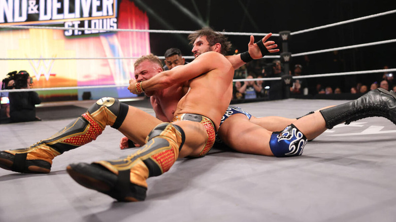 Johnny Gargano cinches in the Gargano Escape onto Myles Borne.