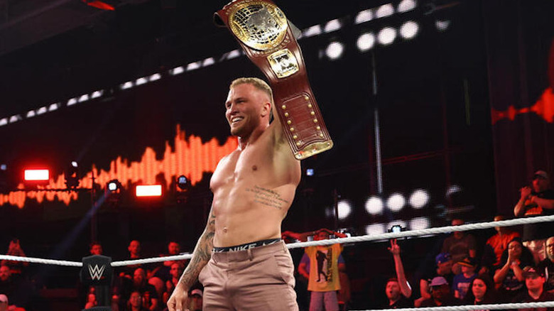 Myles Borne holds up the North American title on "WWE NXT"