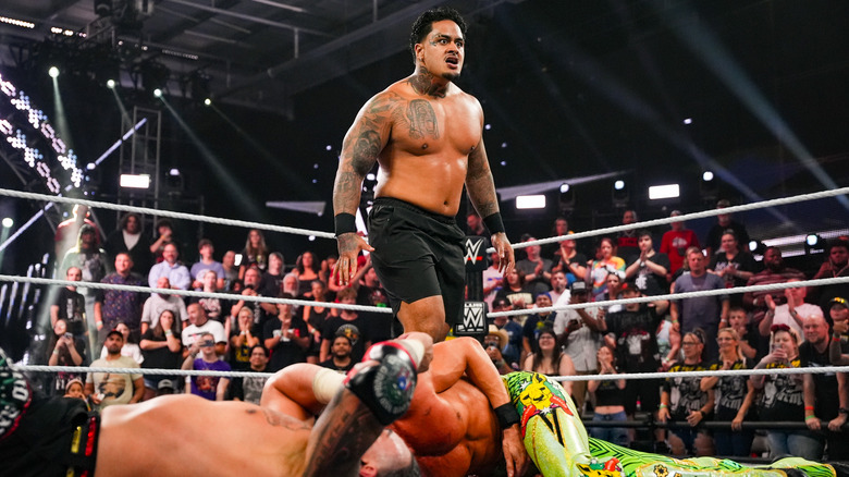 Zilla Fatu in WWE NXT ring after attacking Cruz Montana and Grayson Waller