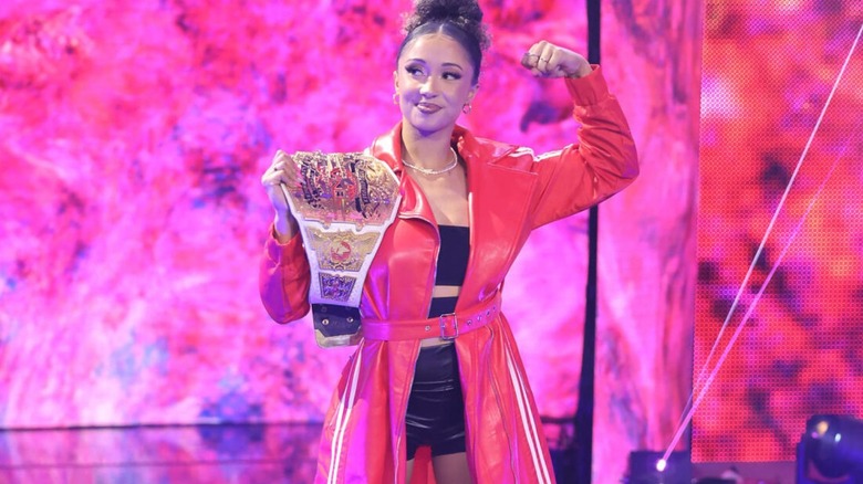 TNA Knockouts Champion Kelani Jordan poses on the ramp with her title before a segment on 