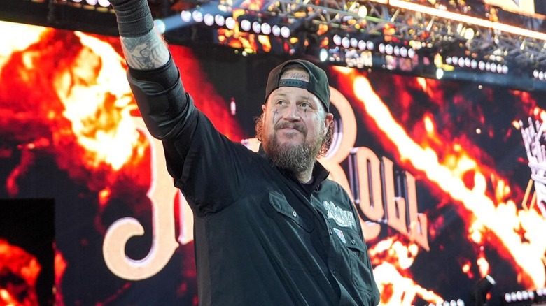 Country music artist Jelly Roll makes his entrance during WWE SummerSlam 2025 ahead of a match alongside Randy Orton.