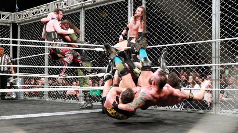 Teams fight around Adam Cole inside WarGames
