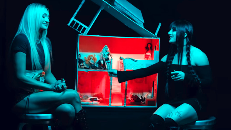 Izzi Dame and Tatum Paxley play with dolls on "WWE NXT"