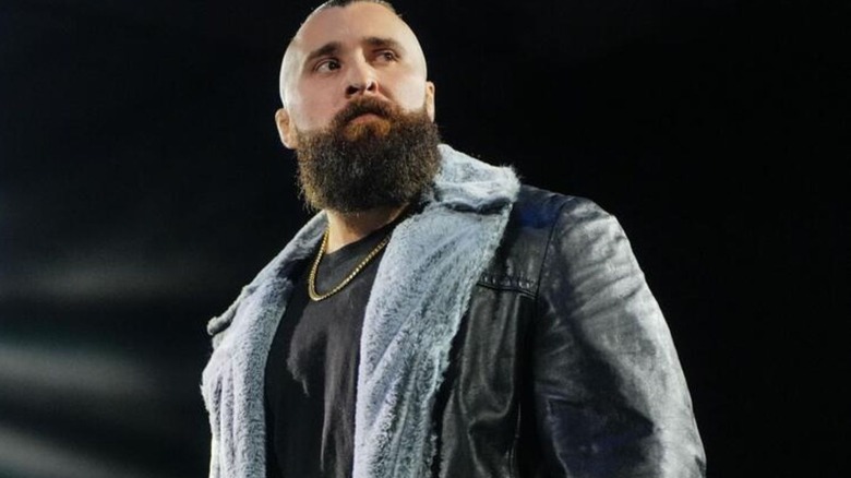Tony D'Angelo looks to the ring from the crowd in the WWE Performance Center upon his return to WWE.