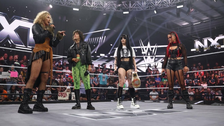Nikkita Lyons and Lizzy Rain confront Zaria and Women's North American Champion Tatum Paxley in the ring during an episode of 