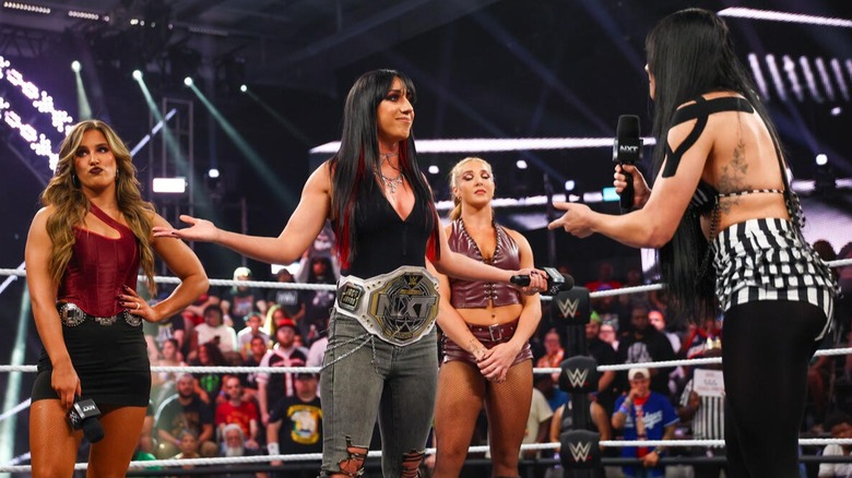 WWE NXT Women's Champion Jacy Jayne stands confidently across the ring from her Halloween Havoc opponent, Tatum Paxley