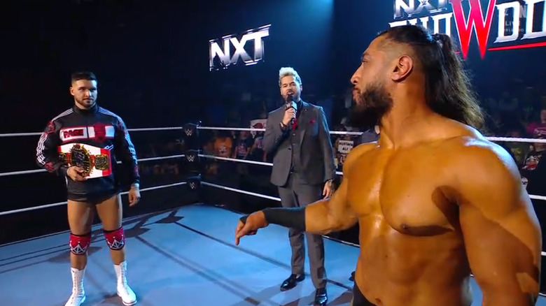 Page and Ali staring each other down during ring announcements