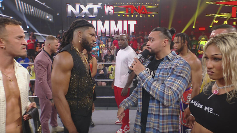 Several NXT and TNA stars staring each other down