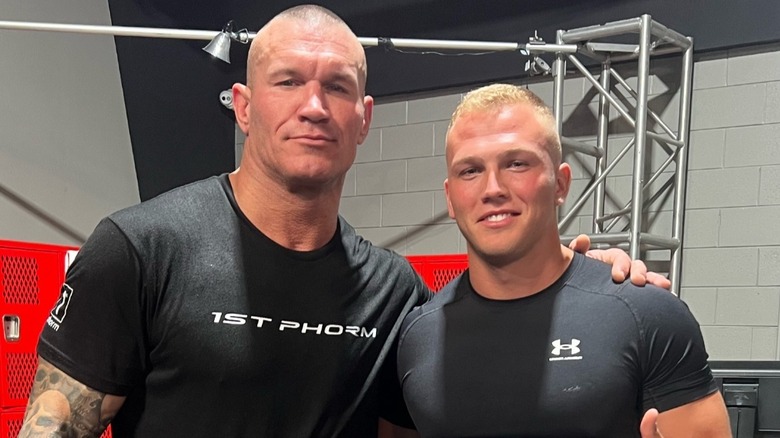 Myles Borne and Randy Orton meet up for a picture after a workout