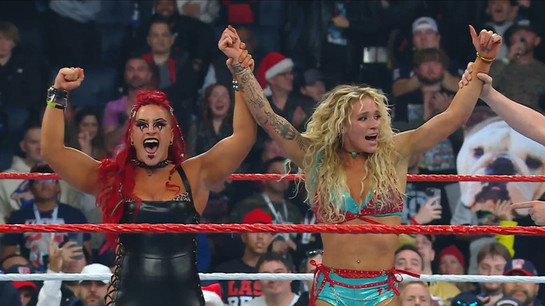 Zaria and Sol Ruca celebrate victory