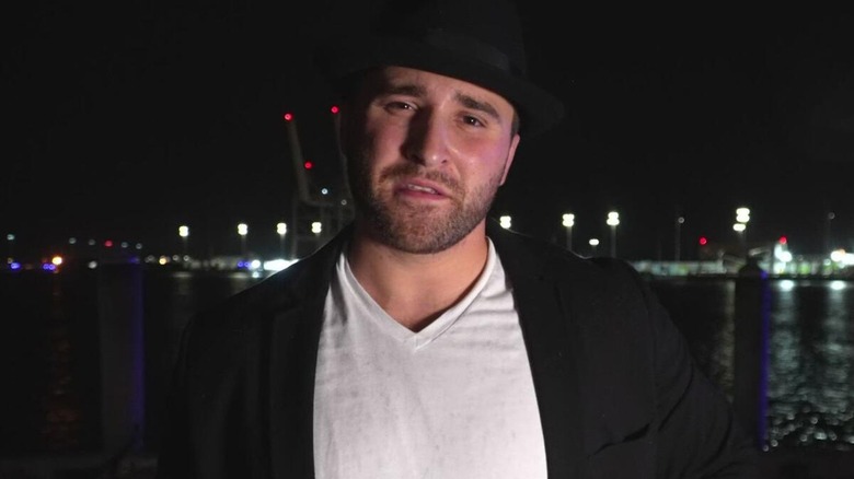 Tony D'Angelo cutting a promo outside at the docks.