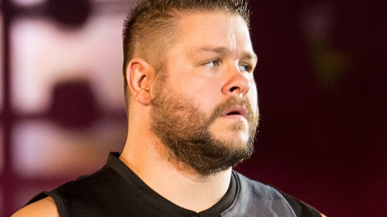 Kevin Owens posing