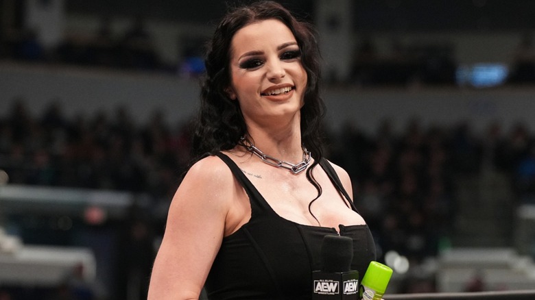 Saraya smiling in the ring 