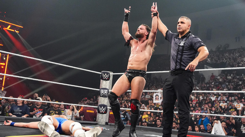 JD McDonagh gets his arm raised by the referee while standing above a fallen Joe Hendry in the ring on "WWE Raw"