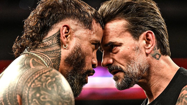 Jey Uso and CM Punk nose to nose on "WWE Raw"