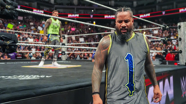 Jey Uso watches Jimmy Uso walk away on "WWE Raw"