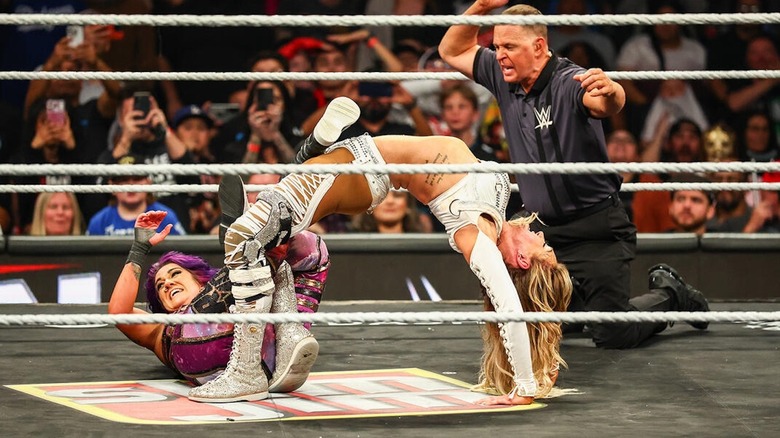 Charlotte Flair with Bayley in the Figure Eight on "WWE Raw"
