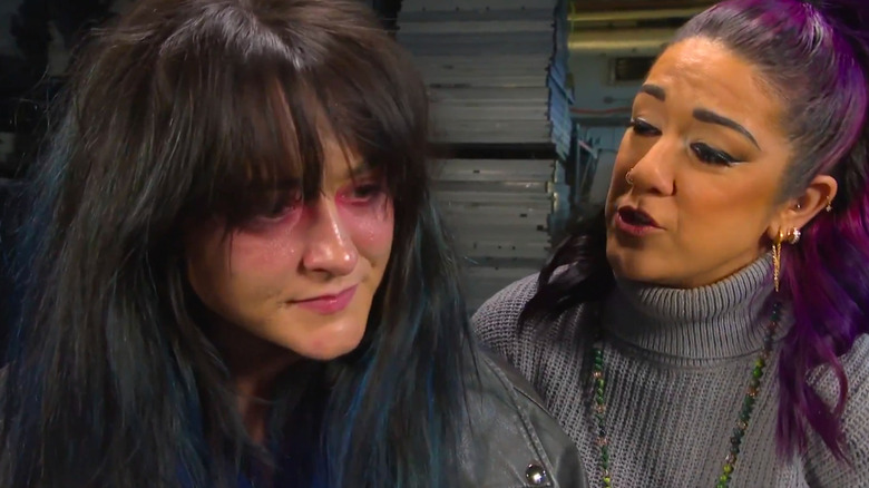 Lyra Valkyria and Bayley backstage