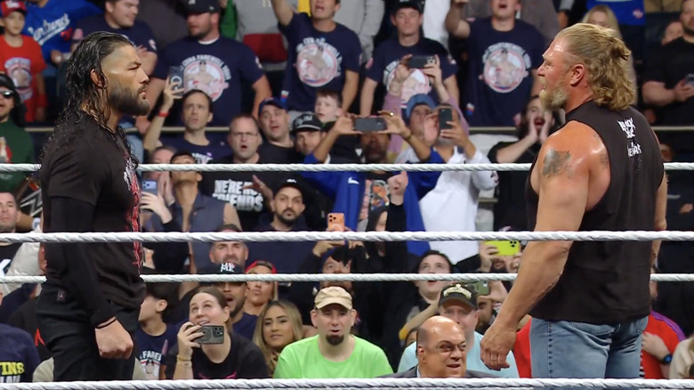 Reigns and Lesnar staring one another down