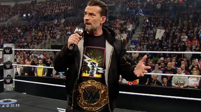 CM Punk with his World Heavyweight Championship