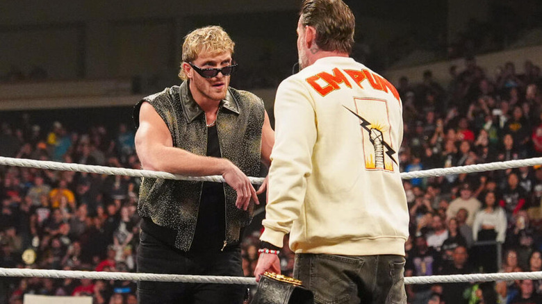 Logan Paul confronts WWE World Heavyweight Champion CM Punk.