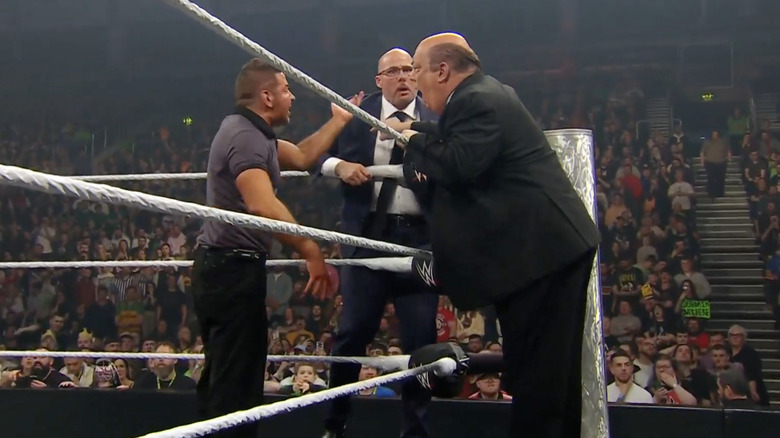 Pearce and Heyman arguing with the referee