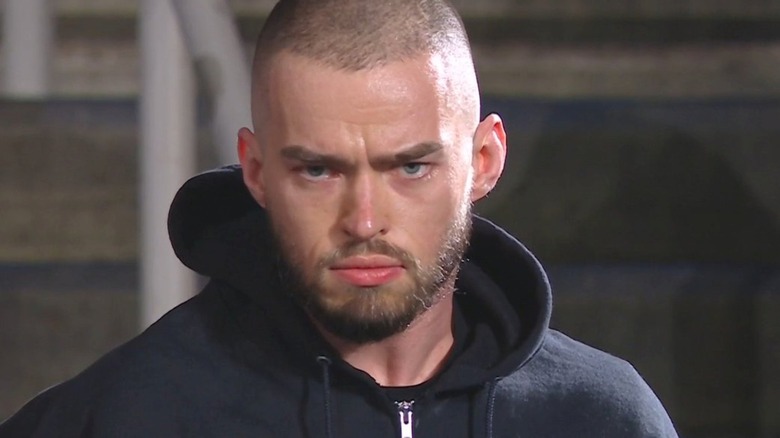 Austin Theory is revealed as the masked man