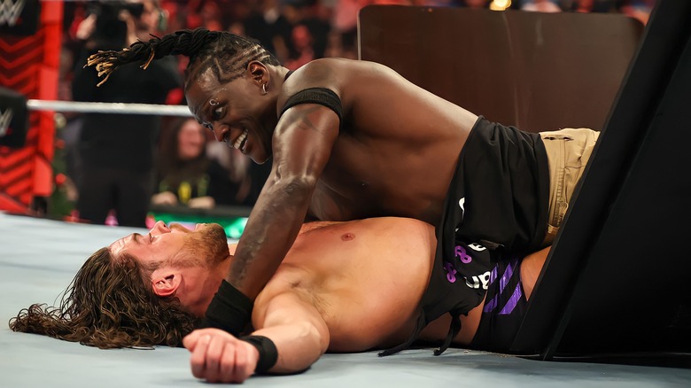 R-Truth grins while lying atop JD McDonagh