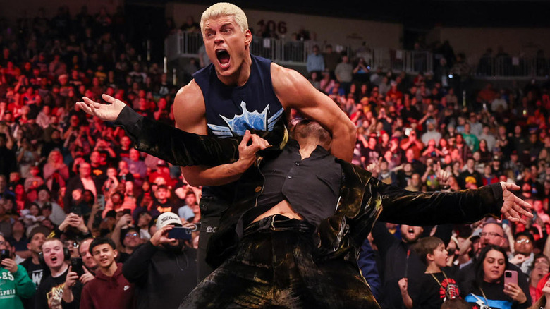 Cody Rhodes preparing to deliver Cross Rhodes to Shinsuke Nakamura