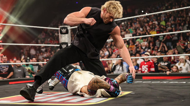 Logan Paul hits mounted punches on Rey Mysterio on "WWE Raw: