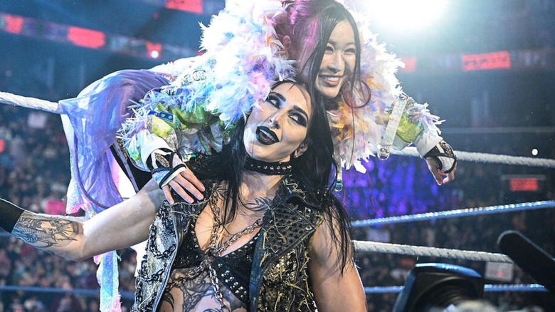 Rhea Ripley and IYO SKY pose on 