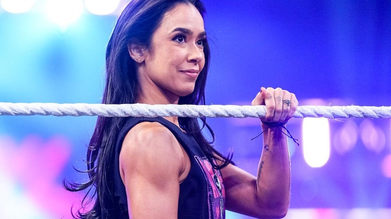 AJ Lee gets in to the ring through the ropes during a promo segment with Becky Lynch on "WWE Raw."