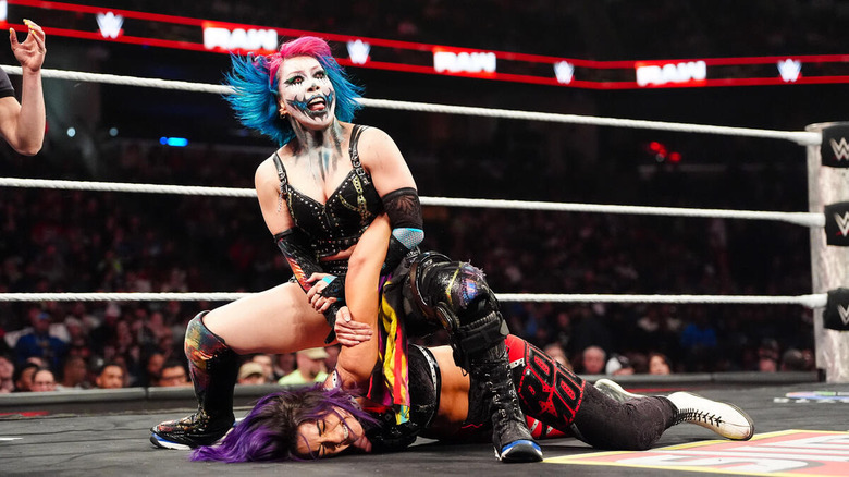Asuka with an armbar on Bayley on "WWE Raw"