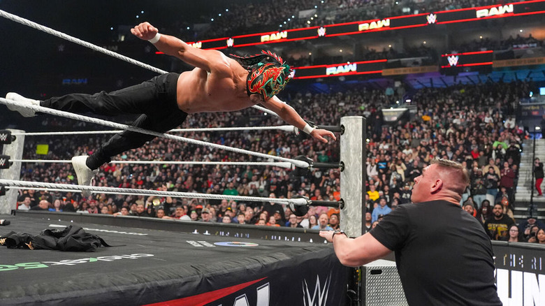Dragon Lee dives through the ropes onto GUNTHER on "WWE Raw"