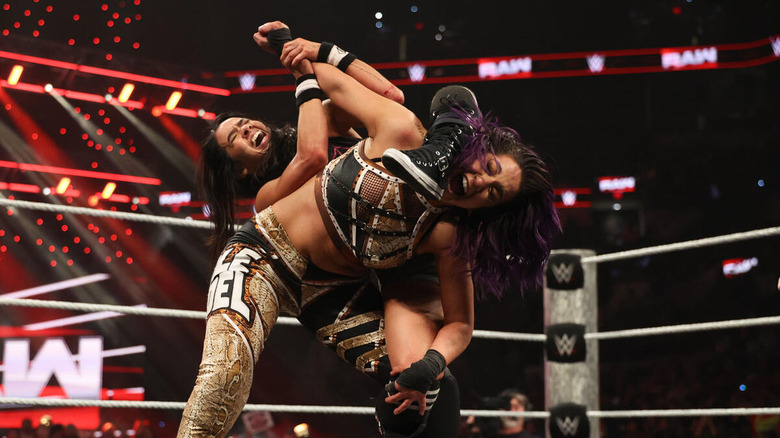 AJ Lee puts Bayley in the Black Widow on "WWE Raw"