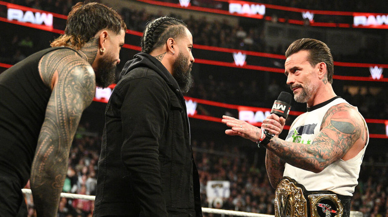 CM Punk and the Usos exchange words
