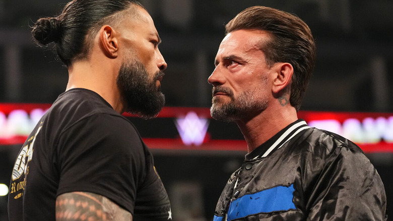 Roman Reigns stares down CM Punk on "WWE Raw"
