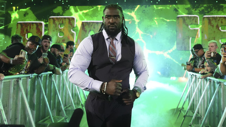 Oba Femi struts to the ring on "WWE Raw"