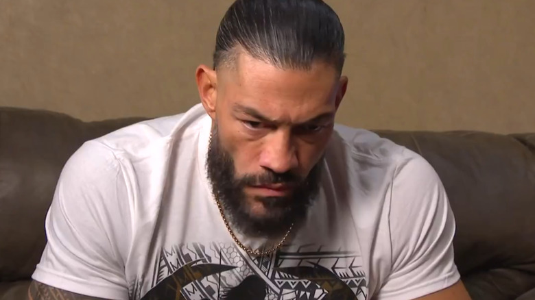 Roman Reigns looking contemplative
