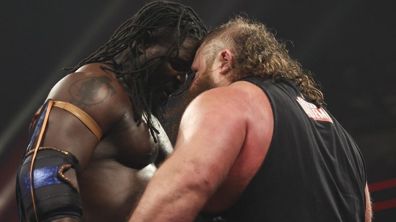 Oba Femi goes nose to nose with Otis on "WWE Raw"