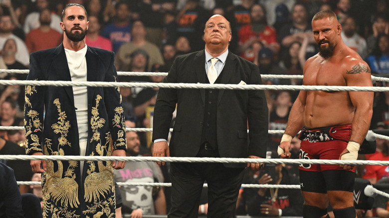 Seth Rollins, Paul Heyman and Bron Breakker after the match during Monday Night RAW at T-Mobile Center on April 28, 2025 in Kansas City, Missouri.