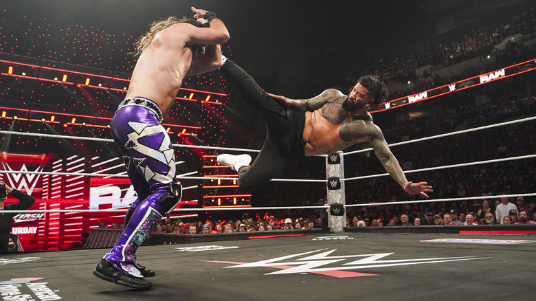 Jey Uso delivers a kick to Seth Rollins on "WWE Raw"