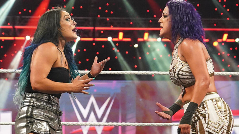 Lyra Valkyria and Bayley have a tense argument.