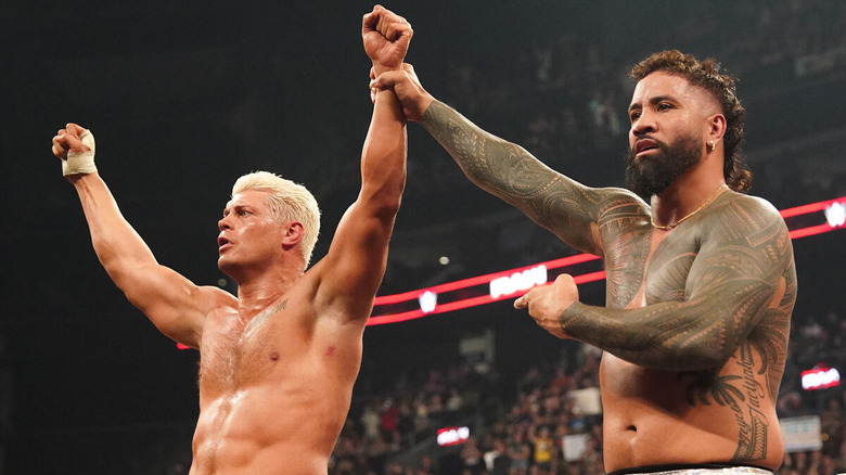 Jey Uso raises Cody Rhodes' arm on "WWE Raw"