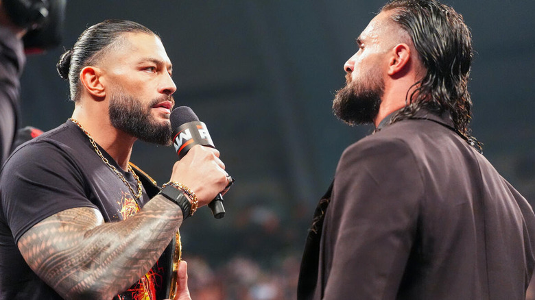 Roman Reigns talks to Seth Rollins on "WWE Raw"
