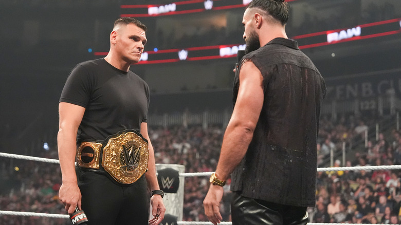 GUNTHER and Rollins in a verbal confrontation