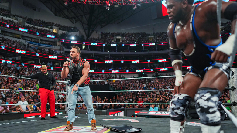 LA Knight in the ring with Solo Sikoa and Royce Keys on either side of him on "WWE Raw"