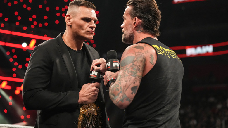 CM Punk covers up GUNTHER's microphone on "WWE Raw"