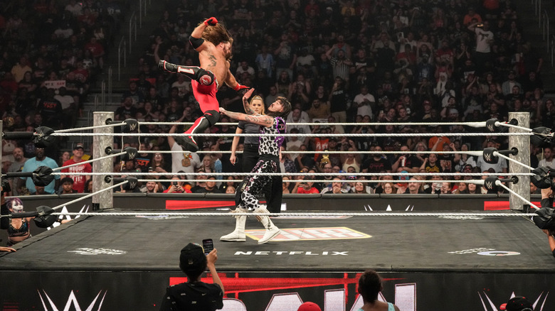 Styles delivering the Phenomenal Forearm to Dominik