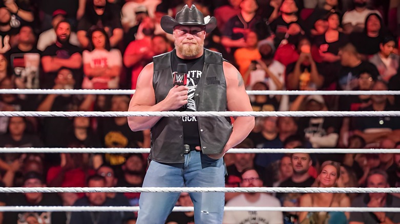 Brock Lesnar holding microphone